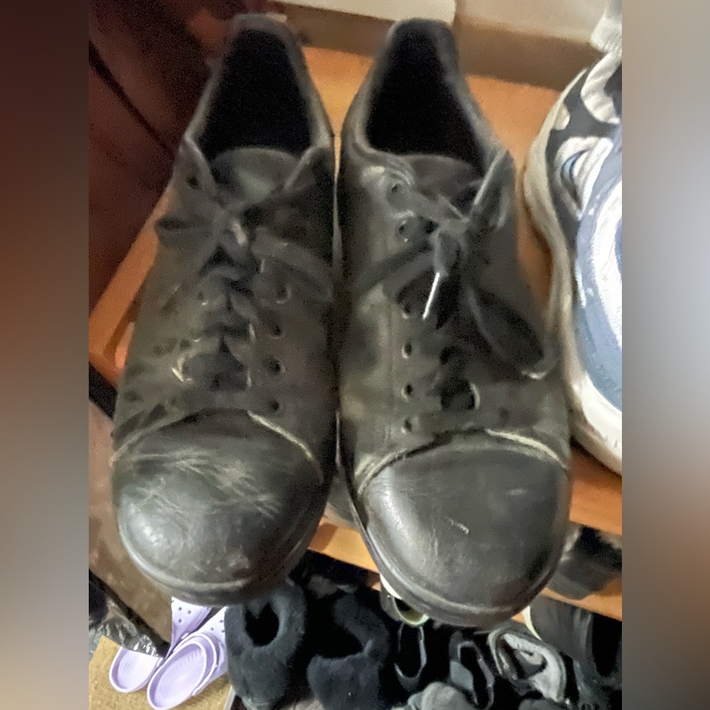 Used black Adidas original running shoes